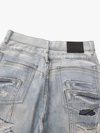 Slashed Graphic Jeans